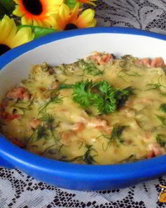 Пельмени, запеченные в сметане с ветчиной и сыром