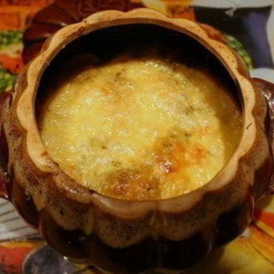 Рецепт жареных пельменей с овощами в горшочке