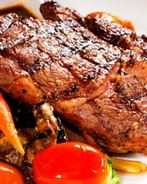 Стейк рибай на гриле с овощами