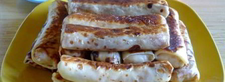 блины с творогом, обжаренные на сливочном масле. Шаг 14