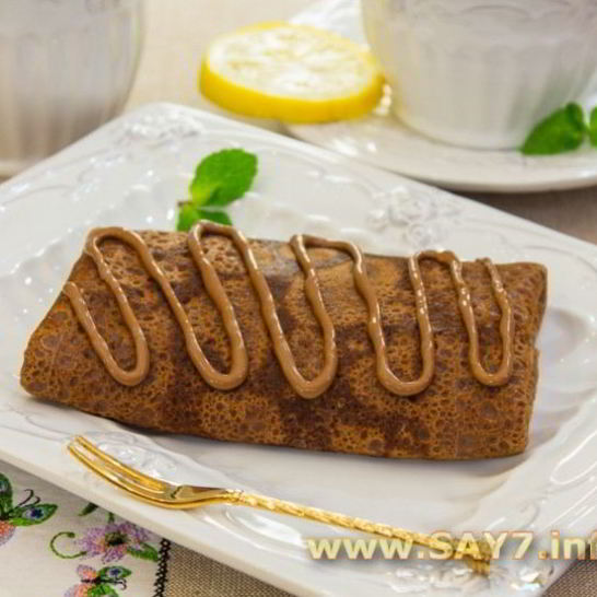 Рецепт шоколадных блинчиков с бананами и орехами