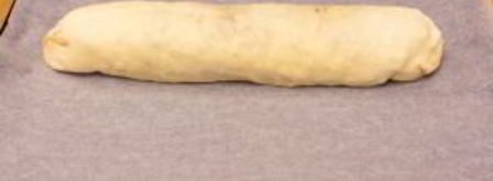 рулет из слоеного теста с яблоками и орехами. Шаг 11